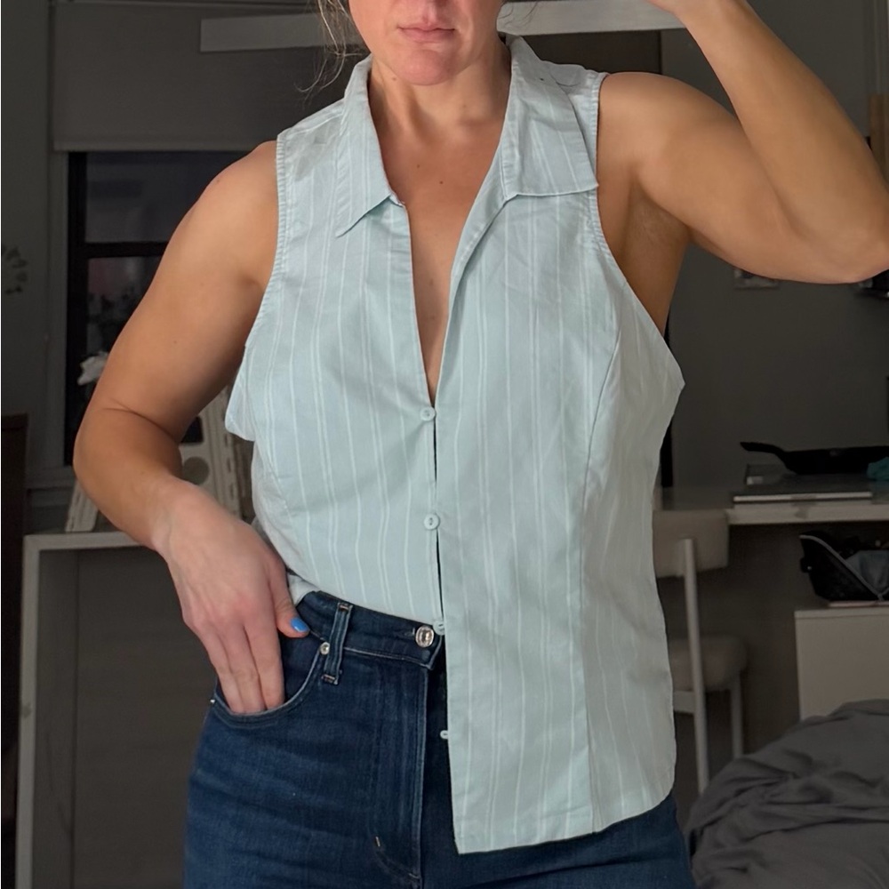 Urban Outfitters Blue/White striped button down sleeveless blouse. Size XL. NWT